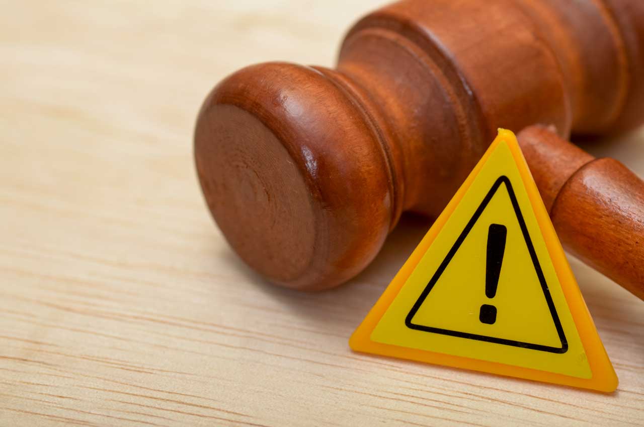 Judge Gavel with Caution Icon
